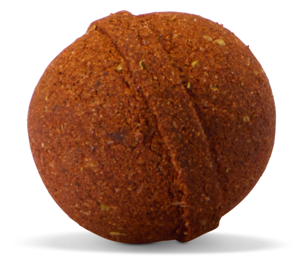 A single EZ Bombs seasoning bomb, showing the seam where its two halves meet