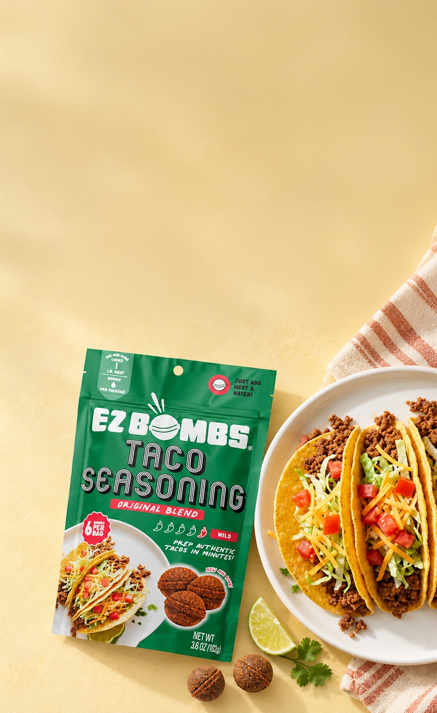EZ Bombs Taco Seasoning pack beside a plate of tacos