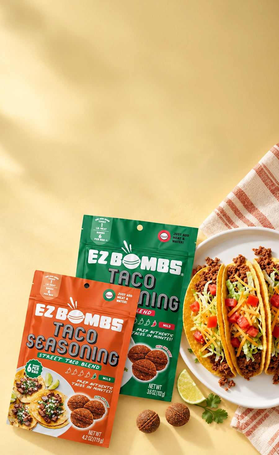 EZ Bombs Taco Seasoning Street Taco Blend and Original Blend pouches beside a plate of tacos